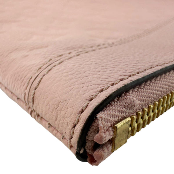 LOUIS VUITTON Daily Pouch Empreinte Leather Clutch Rose Poudre