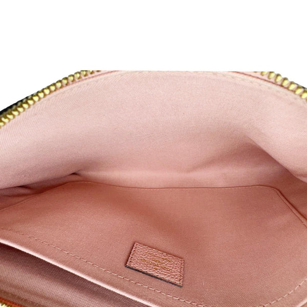 LOUIS VUITTON Daily Pouch Empreinte Leather Clutch Rose Poudre