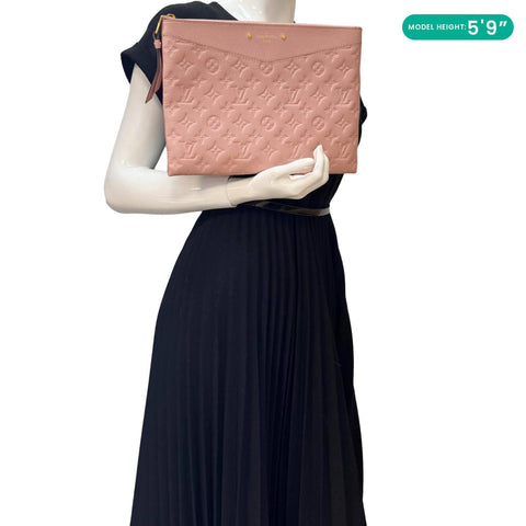 LOUIS VUITTON Daily Pouch Empreinte Leather Clutch Rose Poudre