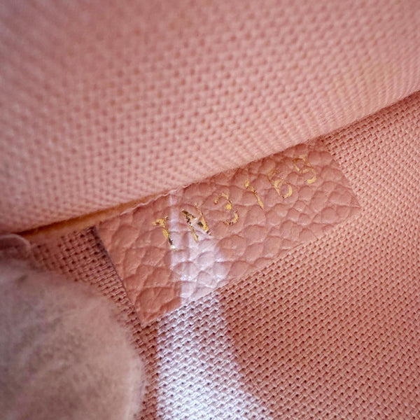 LOUIS VUITTON Daily Pouch Empreinte Leather Clutch Rose Poudre