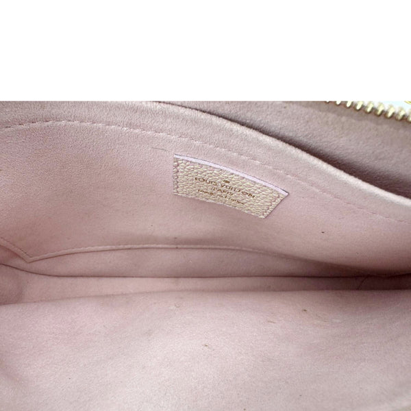 LOUIS VUITTON Pochette Summer Stardust Monogram Empreinte Leather Shoulder Bag Pink