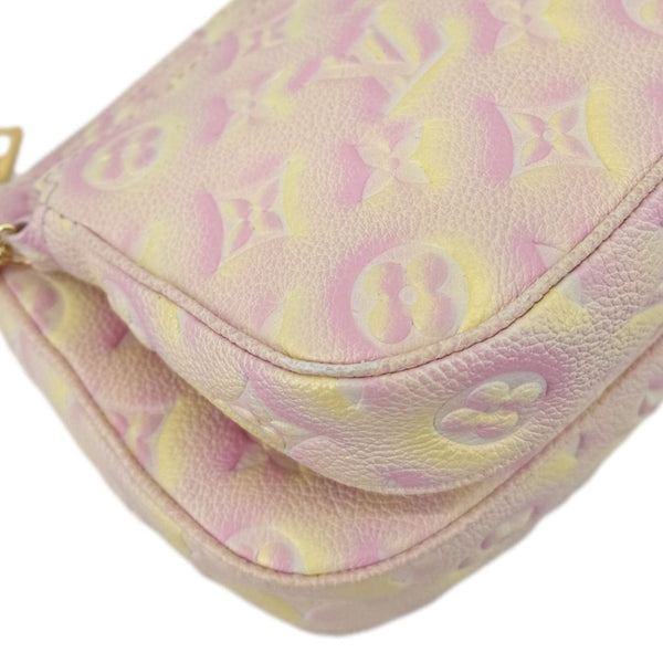 LOUIS VUITTON Pochette Summer Stardust Monogram Empreinte Leather Shoulder Bag Pink