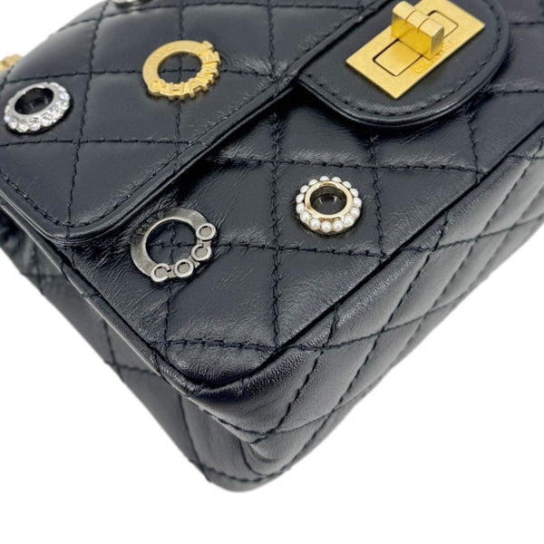 CHANEL Reissue 2.55 Crystal Charms 225 Flap Quilted Leather Crossbody Bag Black