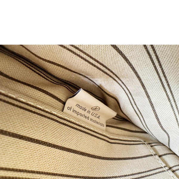 LOUIS VUITTON Neverfull Monogram Canvas Pochette Wristlet Brown