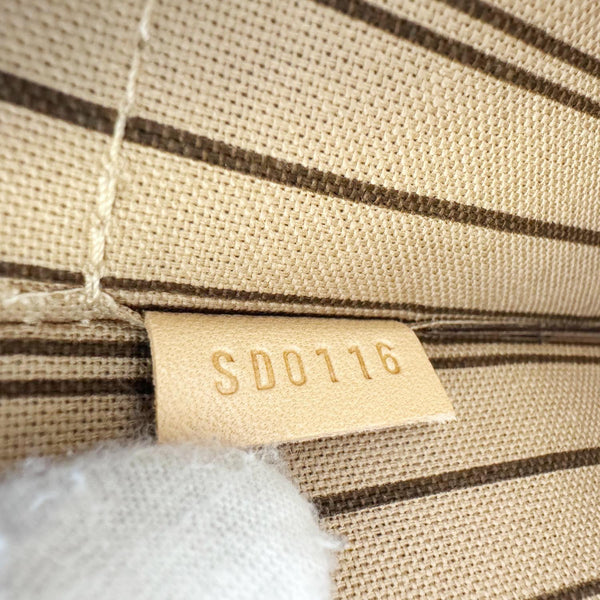 LOUIS VUITTON Neverfull Monogram Canvas Pochette Wristlet Brown