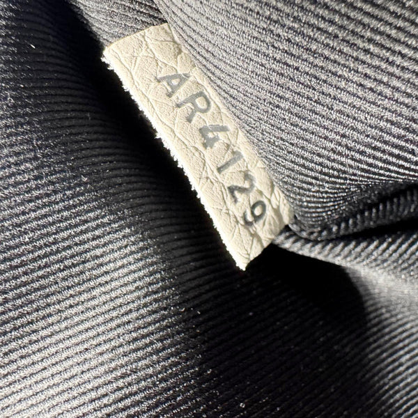 LOUIS VUITTON Triangle Monogram Empreinte Leather Shoulder Bag Off White