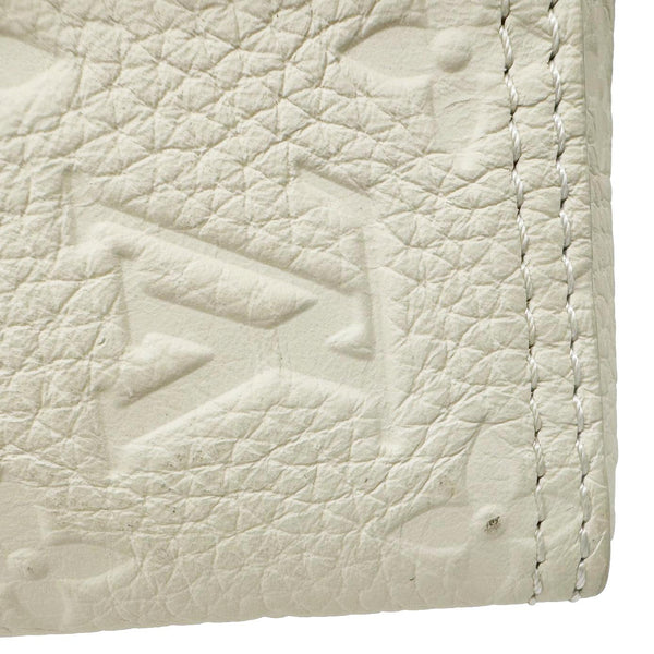 LOUIS VUITTON Triangle Monogram Empreinte Leather Shoulder Bag Off White