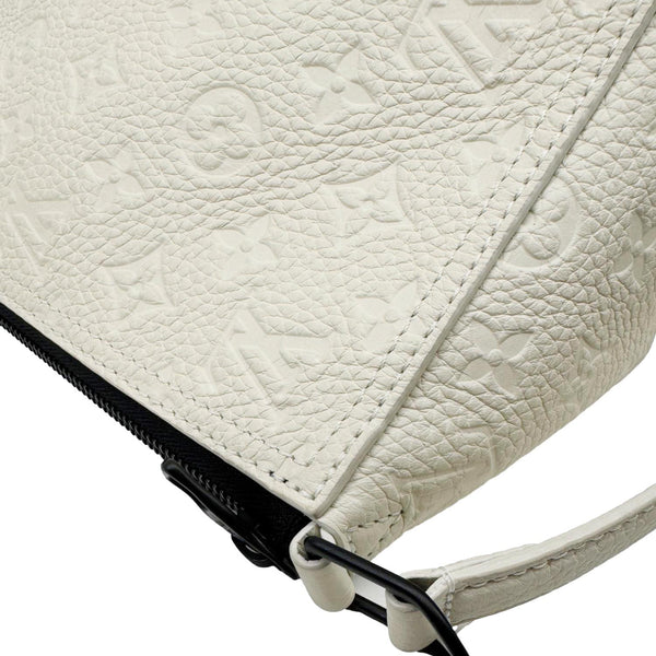 LOUIS VUITTON Triangle Monogram Empreinte Leather Shoulder Bag Off White