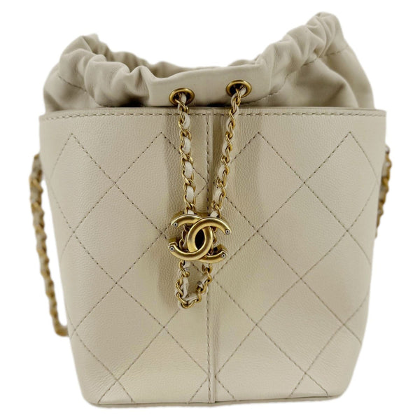 CHANEL CC Drawstring Quilted Leather Crossbody Bucket Bag Cream