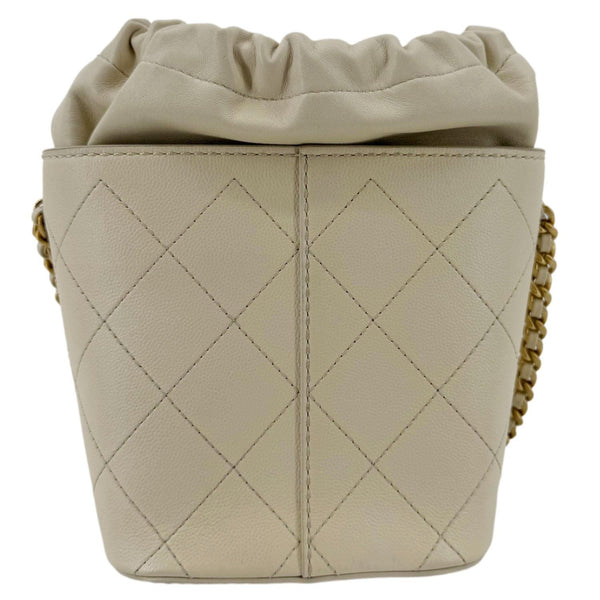 CHANEL CC Drawstring Quilted Leather Crossbody Bucket Bag Cream