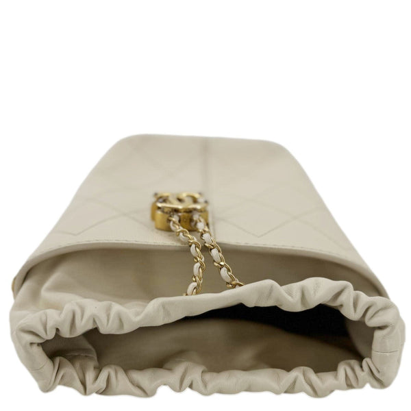 CHANEL CC Drawstring Quilted Leather Crossbody Bucket Bag Cream