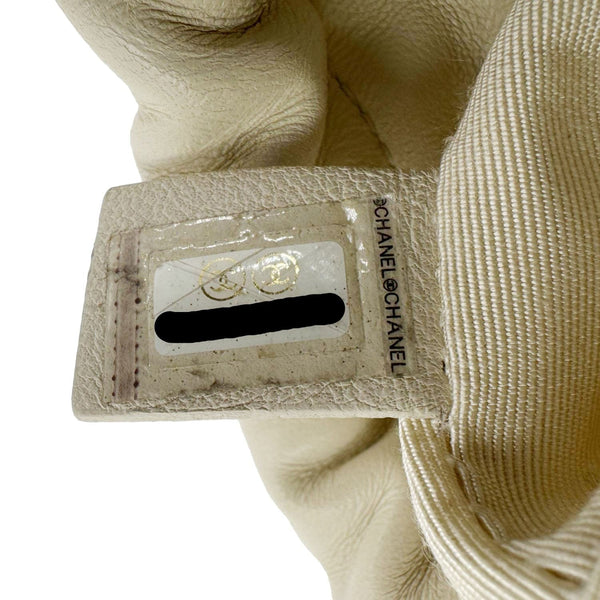 CHANEL CC Drawstring Quilted Leather Crossbody Bucket Bag Cream