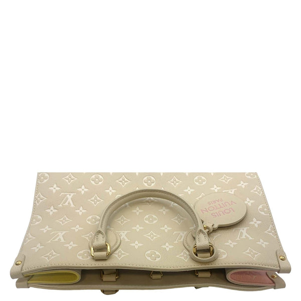 LOUIS VUITTON Onthego Spring City MM Monogram Empreinte Leather Shoulder Bag Cream
