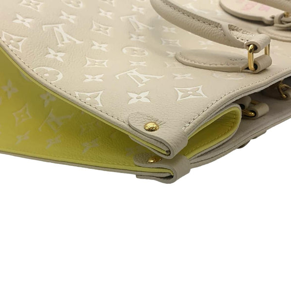 LOUIS VUITTON Onthego Spring City MM Monogram Empreinte Leather Shoulder Bag Cream