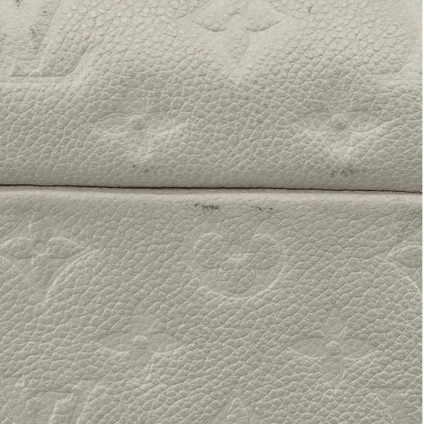 LOUIS VUITTON Artsy MM Monogram Empreinte Leather Hobo Bag Off White