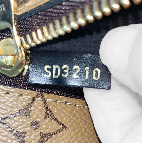 LOUIS VUITTON Metis Pochette Reverse Monogram Canvas Crossbody Bag Brown