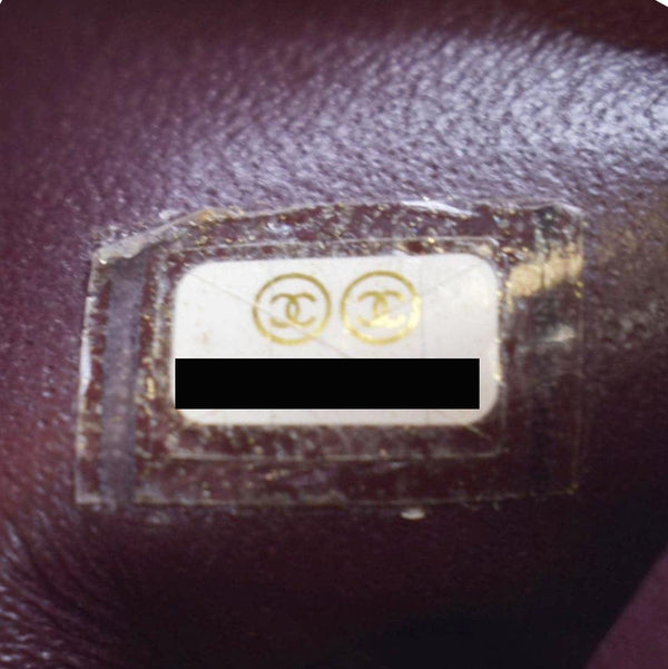 CHANEL Black crossbody bag with gold chain & zip closure