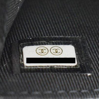 CHANEL Black Quilted Caviar Leather hand bag tag view