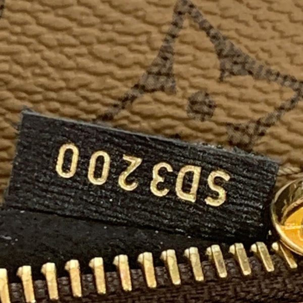 LOUIS VUITTON Metis Pochette Reverse Monogram Canvas Crossbody Bag Brown