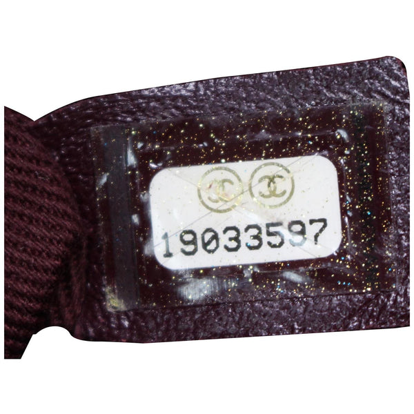 Chanel CC Charm Quilted Lambskin Patent Leather Bag code