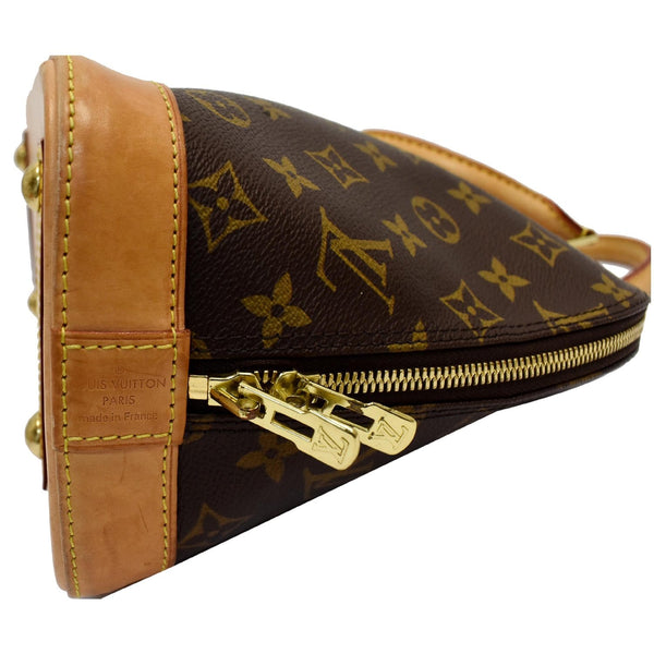 Louis Vuitton Alma Monogram Canvas Satchel Bag Brown - zip closure