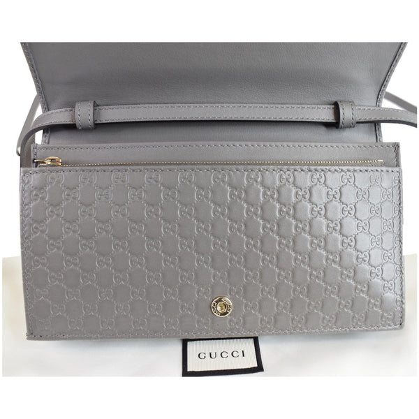 Gucci Micro Guccissima Leather Crossbody Wallet opened view