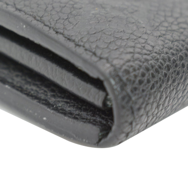 LOUIS VUITTON Sarah Monogram Empreinte Leather Wallet Black