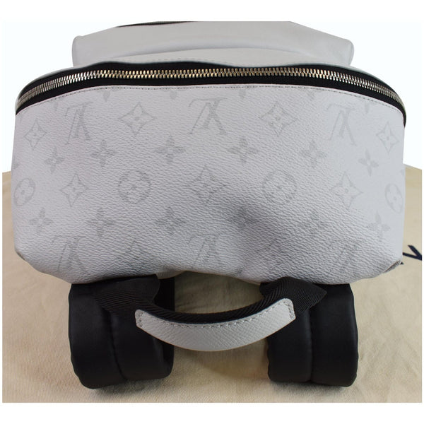 LOUIS VUITTON Discovery PM Taiga Monogram Leather Backpack White