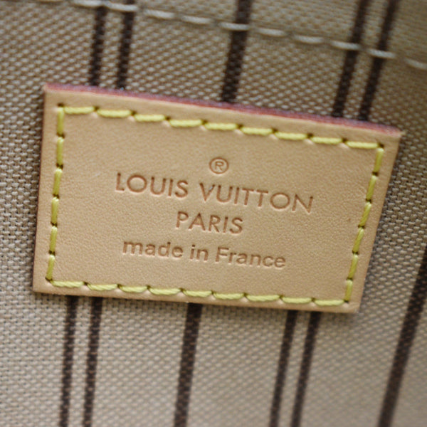 LOUIS VUITTON Neverfull Monogram Canvas Pochette Wristlet Pouch Brown