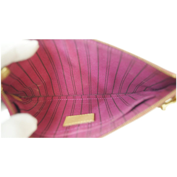 lv Wristlet Neverfull MM interior with pocket