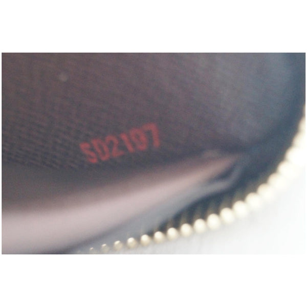 LOUIS VUITTON Zip Around Damier Ebene Wallet Brown