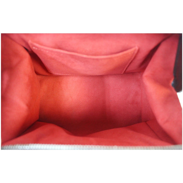 Reddish elegant interior Knightsbridge Damier Ebene Bag