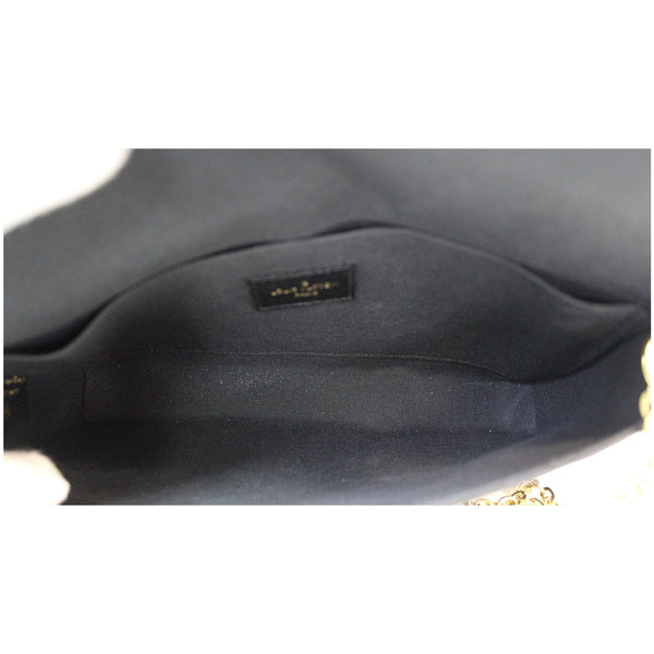 wide interior LV Pochette Felicie Empreinte Leather Bag