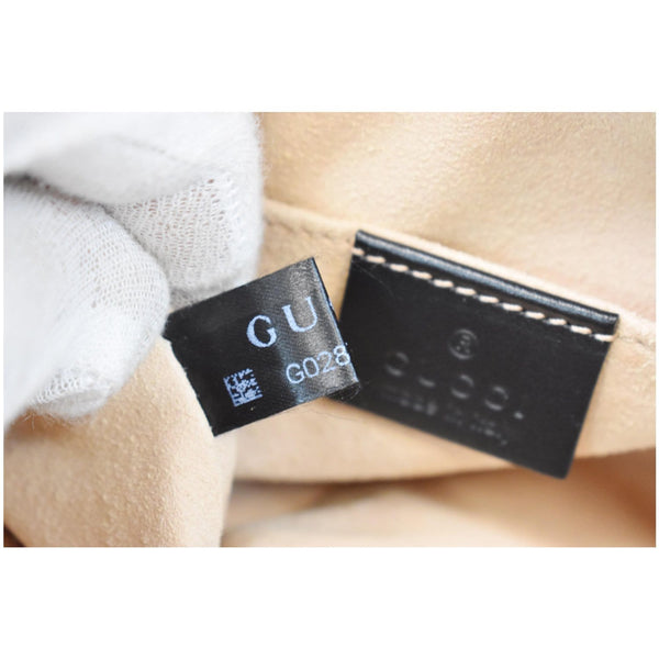 Gucci GG Marmont Matelasse Mini Leather Shoulder Bag tags