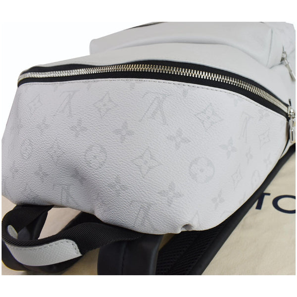 LOUIS VUITTON Discovery PM Taiga Monogram Leather Backpack White