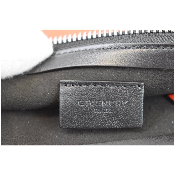 GIVENCHY Emblem Perforated Leather Pouch Bag Red