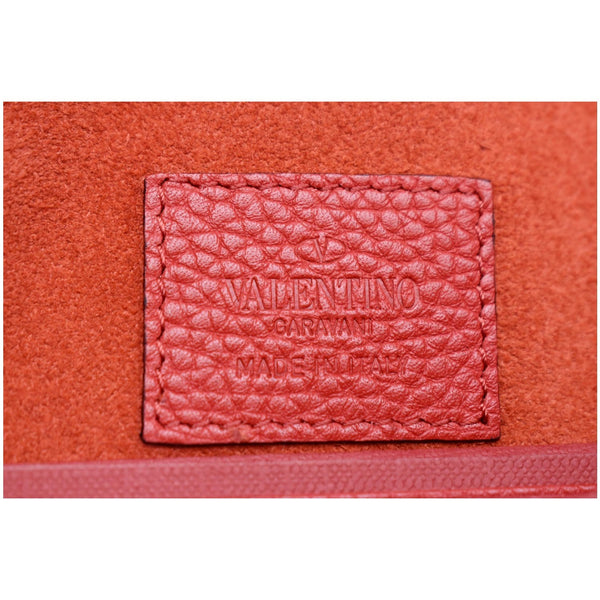 VALENTINO Garavani Rockstud Grainy Envelope Pouch Red