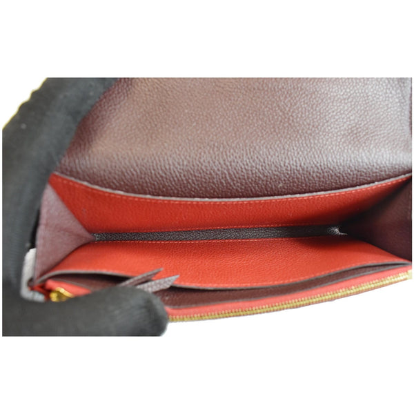 LOUIS VUITTON Emilie Monogram Empreinte Leather Wallet Red