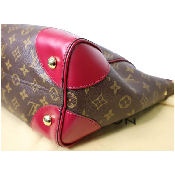 Louis Vuitton Phenix Monogram Canvas bag brass studs