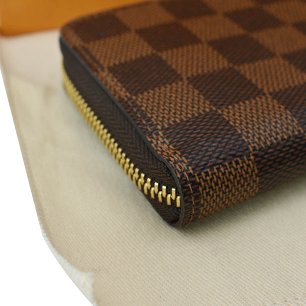LOUIS VUITTON Clemence Monogram Canvas Zippy Wallet Brown