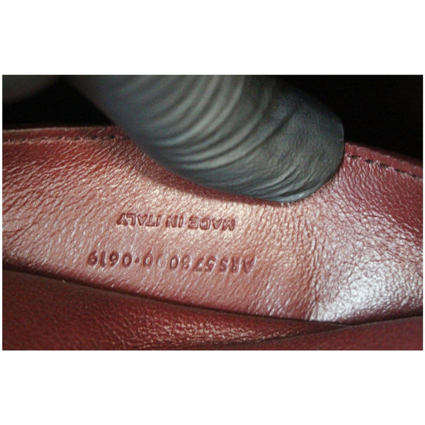 YVES SAINT LAURENT Cassandra Top Handle Embossed Shoulder Bag Black