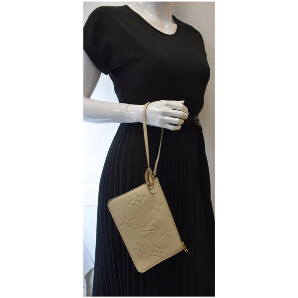 LOUIS VUITTON Empreinte Monogram Neverfull MM Pochette Wristlet Cream