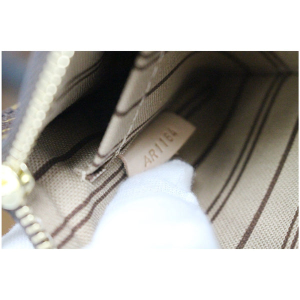 date code Louis Vuitton Wristlet Neverfull PM bag