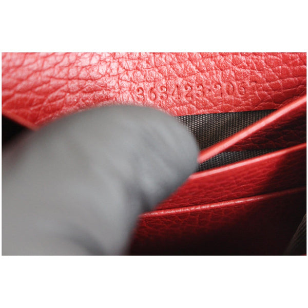 Gucci GG Monogram Canvas Zippy Wallet - item code