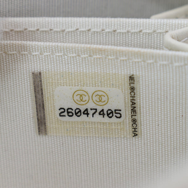 CHANEL Caviar Quilted Small Boy Zip Around Wallet White