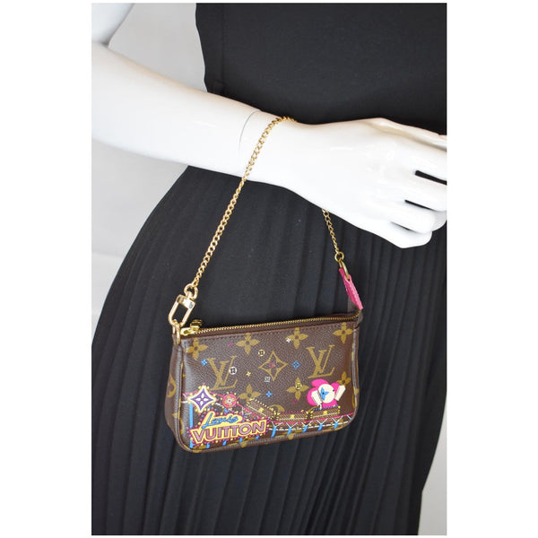 LOUIS VUITTON Mini Pochette Christmas Monogram Canvas Accessoires Pouch Brown