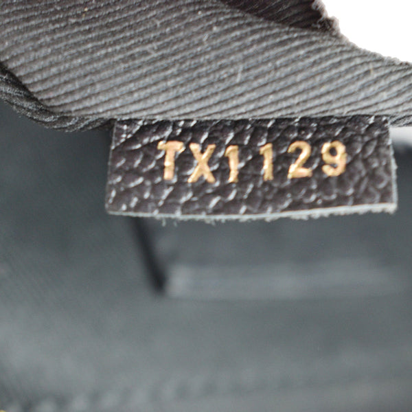 LOUIS VUITTON Palm Springs Mini Monogram Canvas Backpack Brown