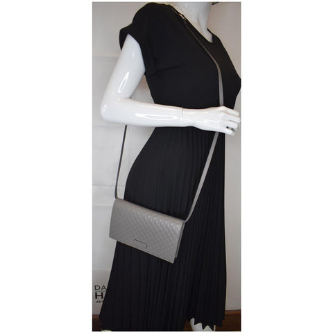 Gucci Micro Guccissima Leather Crossbody Wallet wear view