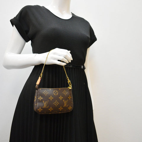 LOUIS VUITTON Mini Pochette Monogram Canvas Accessoires Pouch Brown