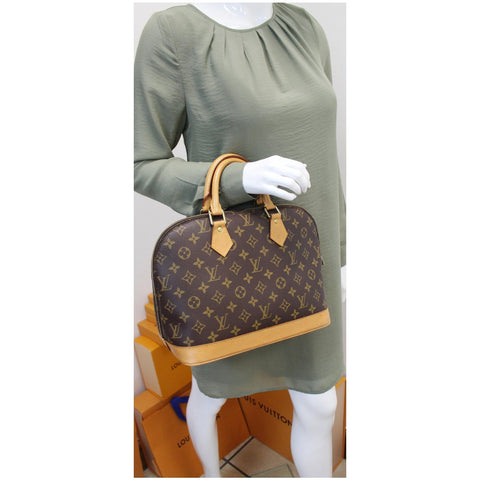 LOUIS VUITTON Alma Monogram Canvas Satchel Bag Brown